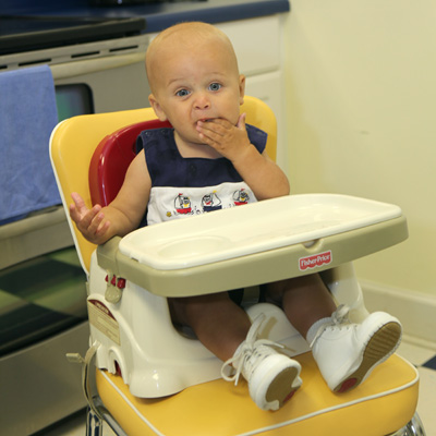 FISHER-PRICE® Booster Seat - This portable booster seat fits on most dining chairs, eliminates the need for a separate high chair and allows your child to join you for meals anywhere you go! Tray is dishwasher safe. 